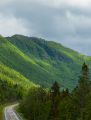 Fototapeta na wymiar Driving through a mountain range in Gaspe, Quebec