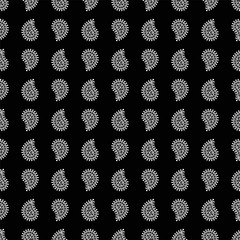 Ornamental seamless pattern. White on black