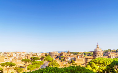 Fototapeta na wymiar Rome cityscape with forum Romano and Colosseum.