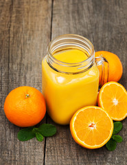 Naklejka na ściany i meble Jar with orange juice