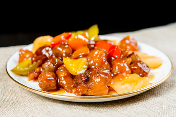 wok fried chicken stir fry with sweet peppers and chinese vegetables