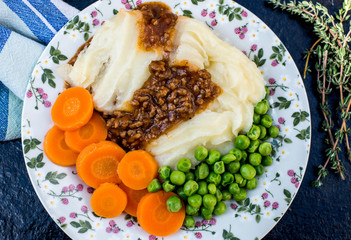 Cottage Pie With Peas and Carrots and Gravy