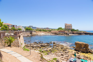 Alghero, Sardinia, Italy. Scenic landscape with medieval bastions on the beach