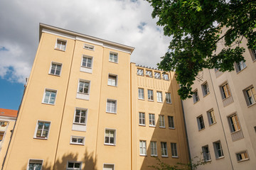 Fototapeta na wymiar big orange and yellow buildings at berlin
