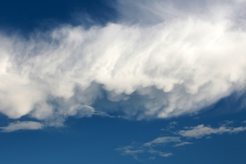 Naklejka na ściany i meble Blue sky and white clouds view from the airplane window