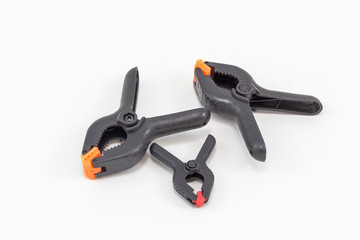 Obraz premium Three spring clamps for a photographic studio.