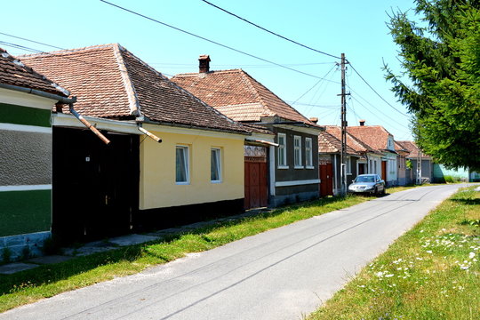 Typical rural landscape in Racos, a village in Brasov county, Transylvania, Romania near one active and three abandoned stone career.