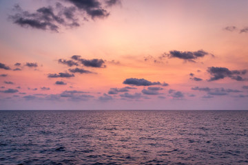 Naklejka na ściany i meble View from a Cruise Ship at Sunset over the Sea