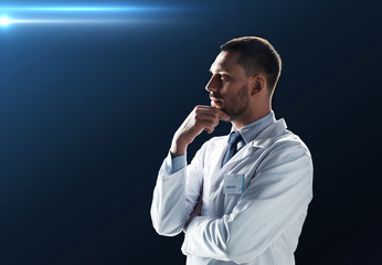 doctor or scientist in white coat