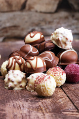 a lot of variety chocolate pralines, belgian confectionery gourm