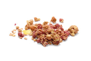 Crunchy granola, muesli pile with blackberry and raspberry isolated on white background