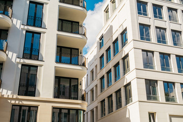 modern apartment building with white facade