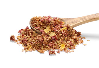 Crunchy granola, muesli pile with blackberry and raspberry in wooden spoon isolated on white background