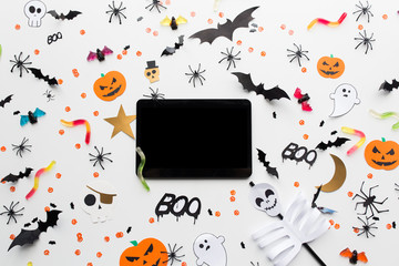 tablet pc, halloween party decorations and candies