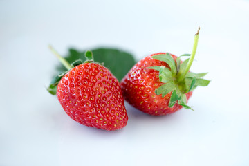 Strawberries with leaves.