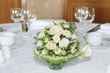 Festive table setting with flowers