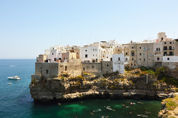 Fototapeta na wymiar Polignano a mare breathtaking sight, Apulia, Italy. Italian panorama. Cliffs on adriatic sea.