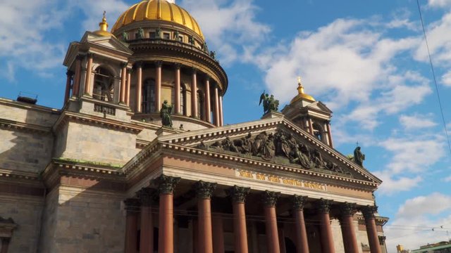 The building of St. Isaac's Cathedral against the sky with clouds