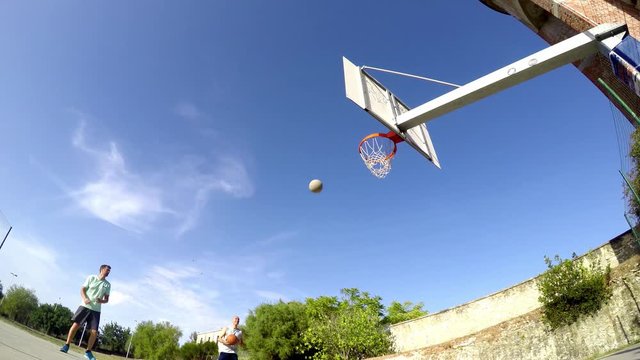 Players warming up in a basketball playground