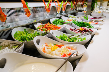 Bowls of salad at the buffet of a hotel restaurant