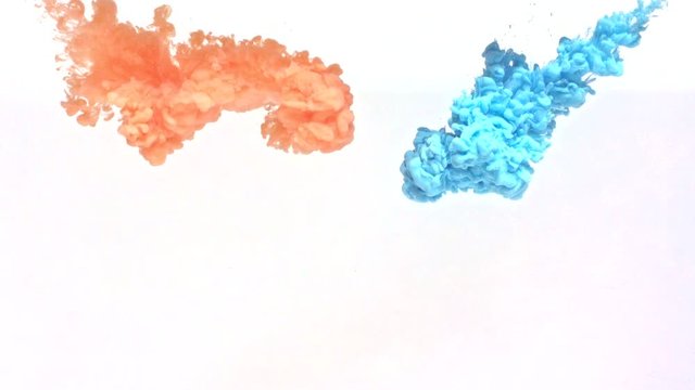 Orange and Blue ink spreading downward in water. Great footage for animated projects or visual effects composites. Make incredible videos that feature an organic look. Use for backgrounds or overlays