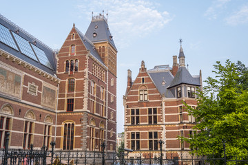 Fototapeta na wymiar The impressive building of the National Museum Amsterdam - AMSTERDAM - THE NETHERLANDS - JULY 20, 2017