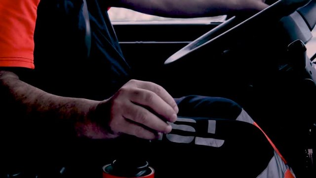 truck driver driving steering wheel and gearbox
