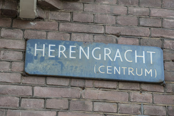 Street sign Gentlemans Canal in Amsterdam called Herengracht - AMSTERDAM - THE NETHERLANDS - JULY 20, 2017