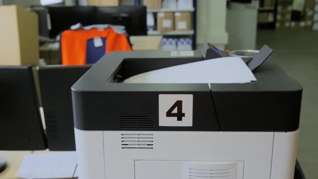 Printer in office printing delivery notes
