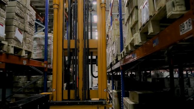 Pallet truck working in warehouse