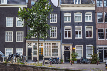 Typical buildings in the historic district of Amsterdam along the canals