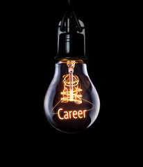 Hanging lightbulb with glowing Career concept.