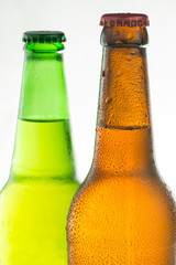 bottles with beer on white background