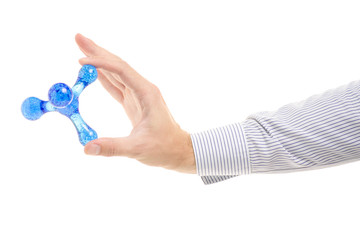 Male hands with a small massager