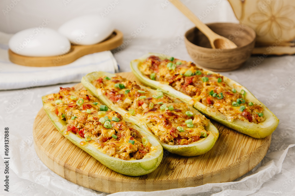 Wall mural stuffed zucchini with chicken, tomatoes and onion with cheese crust