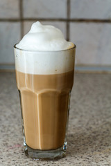 Latte glass cup coffee with foam milk