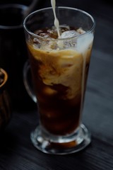 Ice coffee with milk for breakfast view