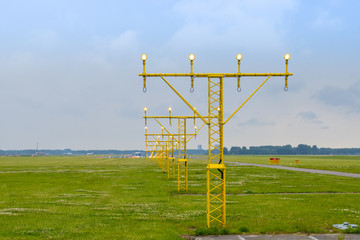 The guiding lights to the runway of an airport