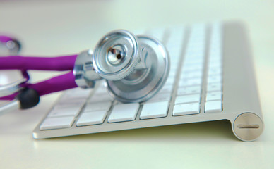 Stethoscope and computer on a desk in the office