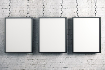 Empty banners on brick wall