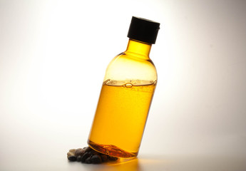 Orange Shower Gel. Cosmetic on stones