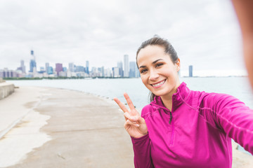 Woman taking a selfie after workout in Chicago