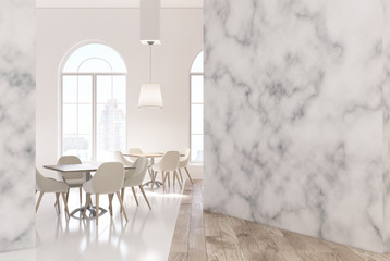 White and marble restaurant interior