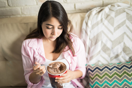 Woman Sad Eating An Ice Cream After Break Up