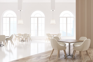 White and wooden restaurant interior