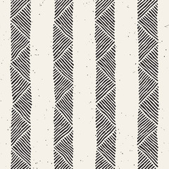 Hand drawn style ethnic seamless pattern. Abstract geometric tiling background in black and white.