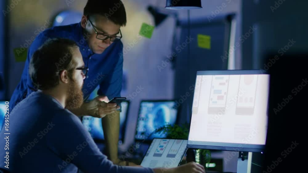 Poster two male mobile application developers design and create quality product. it's late at night they' t