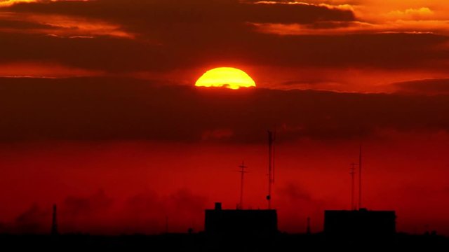 sunset sunrise Day to Night time-lapse over the city.
