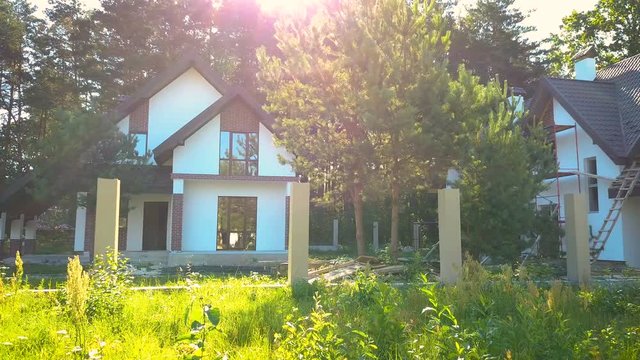 Cottage building construction aerial hard natural flares