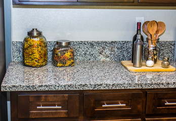 Kitchen Utensils & Containers On Marble Counter